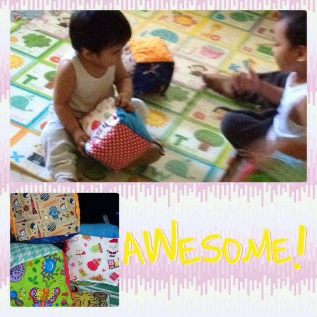 Mommy Grace's Little Boy playing with Tahi Kho's Cuddle Cubes