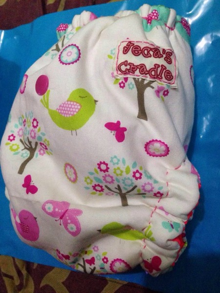 Jeca's Cradle's Hybrid Fitted Cloth Diapers. 