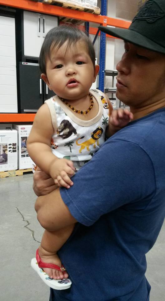 Here's how an amber teething necklace looks when worn. Shown in this photo is Baby Ciann Del Rosario with his dad. His Mom, Mommy Tricia says it has helped Ciann to deal with teething pain, in fact he is now wearing bigger-sized Amber necklace until now. (this photo was earlier published at happypinaymommy.com on May 2016 with the permission of Mommy Tricia