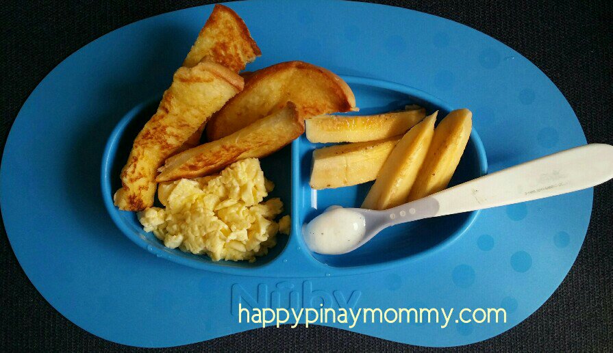 He was about 10 months when I served this and so the toast have been sliced into strips, and the scrambled eggs are in bits as he can safely eat them that way. He also had a pre-loaded spoon of Greek yogurt to go with his Toast. 