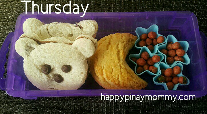 Choco hazelnut bear sandwiches na parang may goiter dahil bulging ang mata, plus green peas na red ang coating, and then moon cookie.