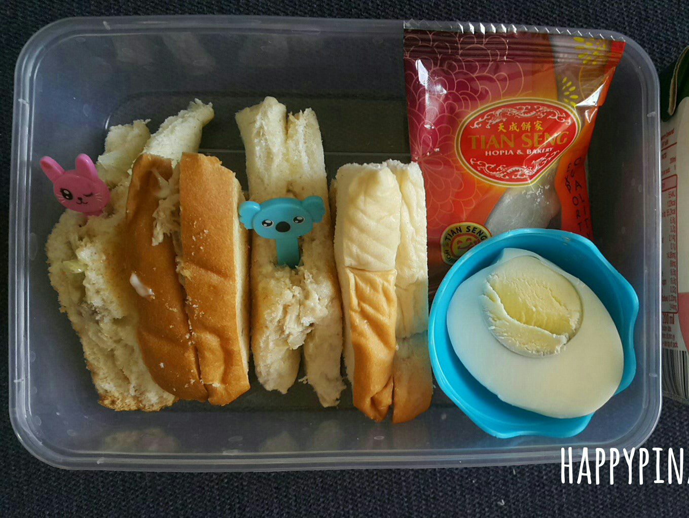 Chicken sandwich, boiled egg and mini tikoy.